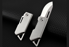 کیفیت چاقو آنباکسینگ تیتانیومی تاشوی قابل آویز از دسته کلید D2 steel small steel cannon mini folding knife
