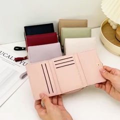 کیفیت کیف پول زنانه تاشو تائومیک‌میک