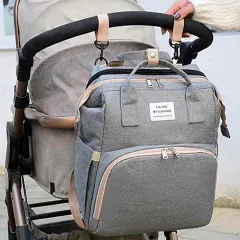 فروش کوله پشتی چندکاره مادر و کودک تخت شو با جیب بطری